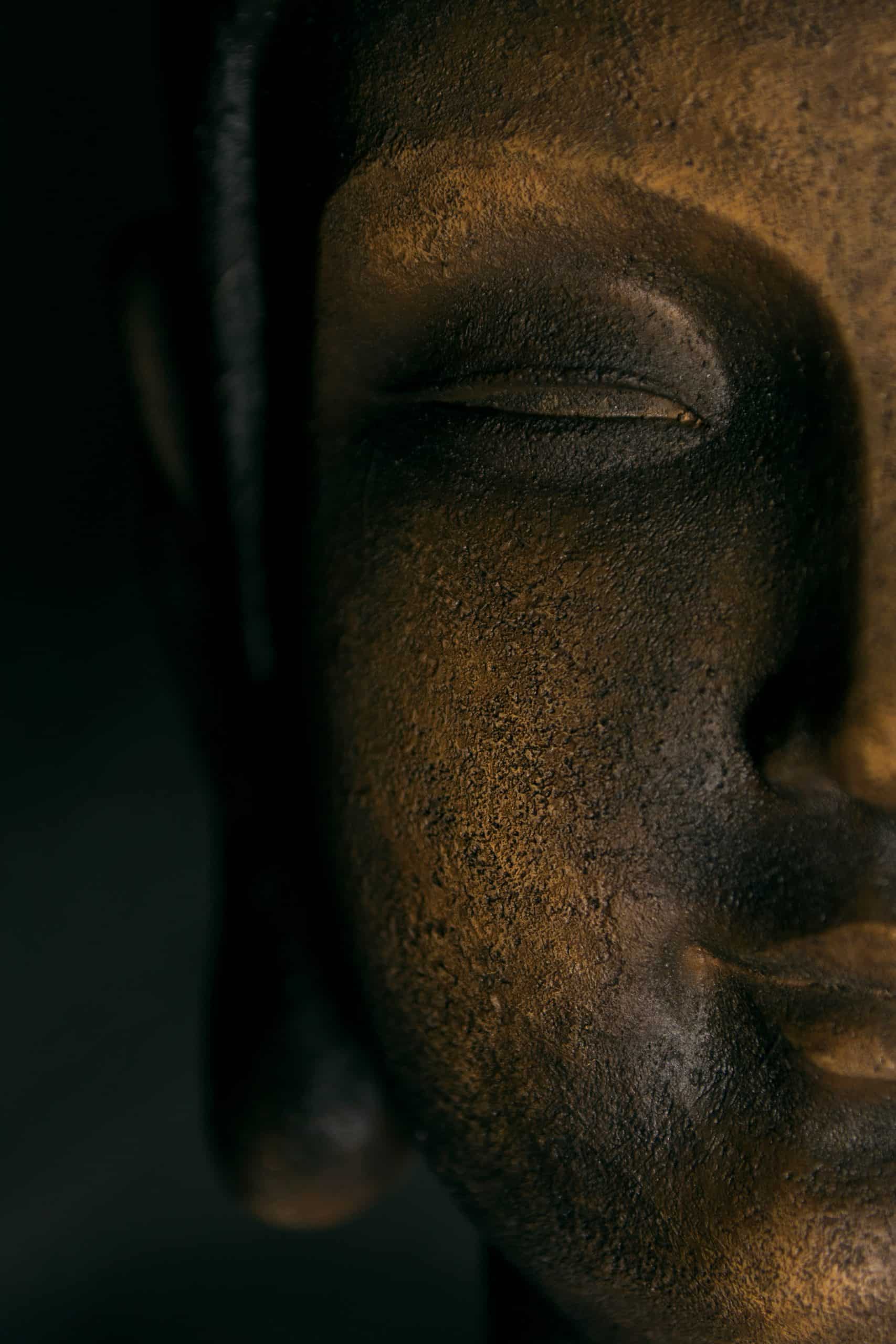 Nahaufnahme des Gesichts einer Buddha-Statue